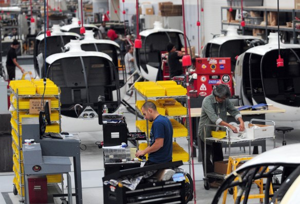 Workers assemble the first batch of the new Robinson R66 helicopters at their Torrance facility. Oct. 29, 2010. (Daily Breeze photo by Steve McCrank / Staff Photographer)