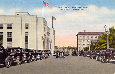 Undated postcard ca. 1940s shows the post office/federal building on the left and city hall up the street on the right.