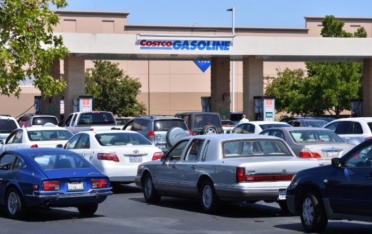 Customers line up for lower priced gas at Costco in Torrance. February 2014 file photo. (Brad Graverson / Staff Photographer)