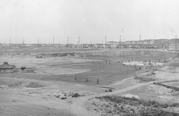 Undated photo ca. late 1960s shows Alta Vista Park in Redondo Beach under construction. View looking southeast shows site of ballfields, left foreground, and left rear behind octagonal rest rooms/snack bar  building, which was renamed the (Breeze file photo)