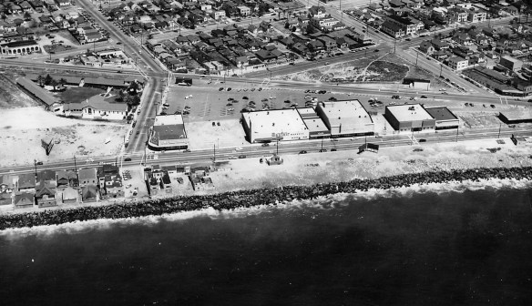 The Triangle Shopping Center in 1949, bounded by Hermosa and Pacific avenues bottom and top, and Beryl Street (left center). Buildings for the four major stores are in place, including Owl-Rexall Drugs, left, and Mayfair Market. Some open spaces remain. (