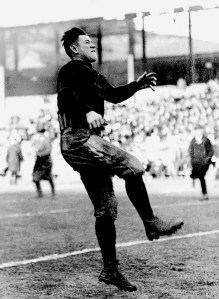 Jim Thorpe of the Carlisle Indian School gets off a kick during warm-ups before a game in this 1912 photo. Thorpe scored 25 touchdowns and 198 points that year in leading his team to the national collegiate championship. (AP Photo)