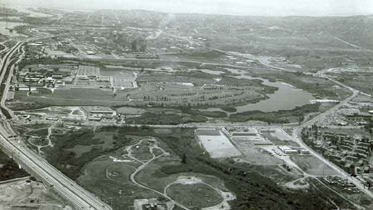 This undated file photo looking south shows Bixby Slough, right center. A canal would have connected the slough to the West Basin of the Port of Los Angeles (at upper left under Andreani's plan. Vermont Avenue is at right, with the 110 Freeway at left.