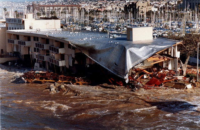 Redondo Beach Portofino Inn's southern section collapses after huge storm waves smash a gap in harbor breakwall and surge into the marina on  Jan. 18, 1988. Daily Breeze file photo.