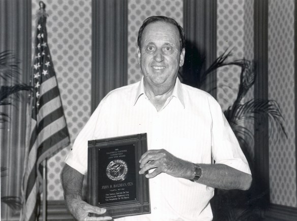 Jack Bauman poses with his Jack Wick California Certified Nurseryman Award in this December 1989 Daily Breeze file photo.