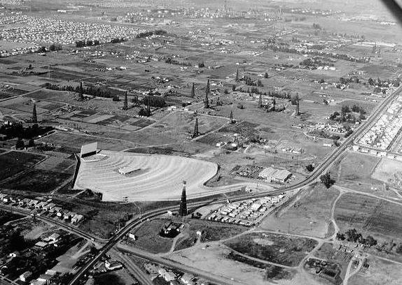 The Torrance Drive-In Theatre dominates this aerial photo of West Torrance taken in 1956. Torrance Boulevard runs diagonally acrost the lower third of the photo. (Credit: Torrance Historical Society.)