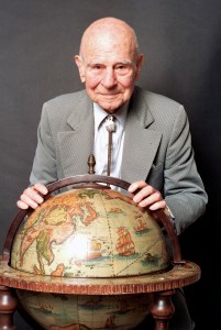 Gen. James H. "Jimmy" Doolittle poses behind a globe at his home in Carmel Valley, Ca., in Dec. 1986. Doolittle led the "30 Seconds Over Tokyo" raid, the mission that helped turn around America's war against Japan and earned him the Congressional Medal of Honor. (AP Photo/Eric Risberg)
