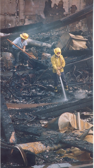 Firefighters mop up at the Dec. 4, 1984 blaze at the Proud Bird restaurant near LAX. Daily Breeze file photo by Brad Graverson.