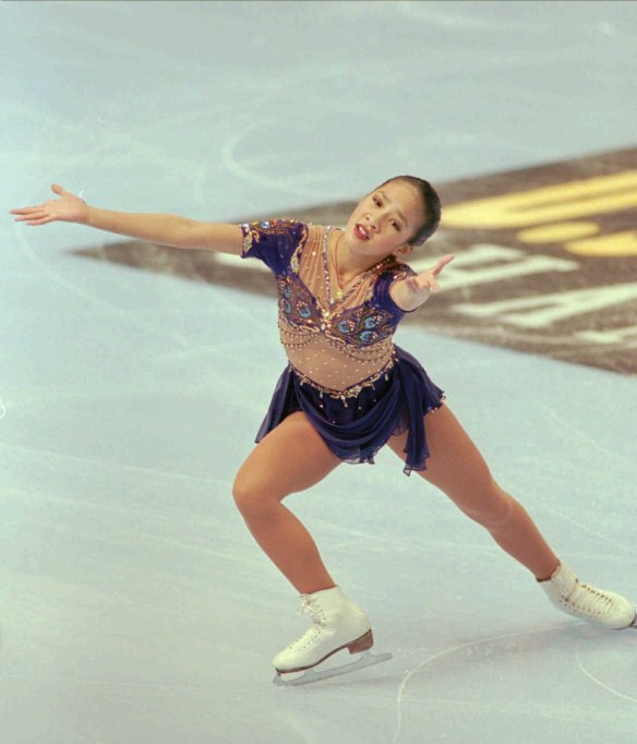 New U.S. women's skating champion Michelle Kwan, 15, of Torrance, Calif., performs her winning long program routine at the U.S. Figure Skating Championships in San Jose, Calif., Saturday, Jan. 20, 1996. (AP Photo/John Makely)