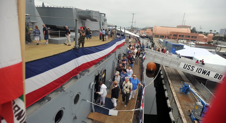 A crowd lines up for the first day of public entry to the USS IOWA on located at Berth 87 at the Port of Los Angeles on July 7, 2012. (Brittany Murray / Staff Photographer)