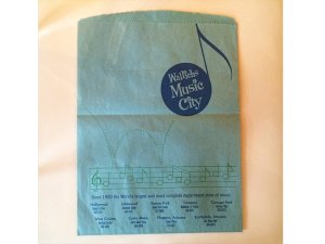 Store locations are listed on the distinctive Wallichs Music city paper bags.