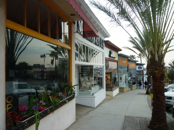 L to R: An interior design firm (white storefront), a Subway sandwich shop and a couple of boutiques now occupy the Hermosa Beach building where the Either/Or Bookstore stood for 33 years. (December 2014 Daily Breeze file photo)