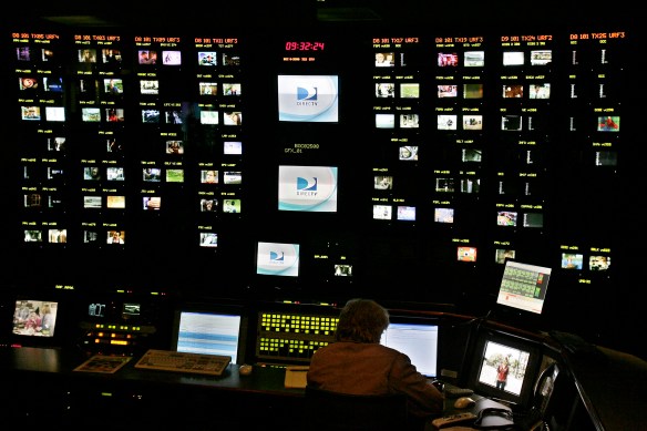 A broadcast operator monitors signals transmitted to DirecTV customers from the satellite television company's broadcast center on Wednesday, May 7, 2008, in Marina Del Rey. (AP Photo/Ric Francis)
