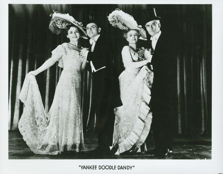 Publicity photo shows, from left, Jeanne Cagney, Jimmy Cagney as George M. Cohan, his "mother," Rosemary DeCamp, and Walter Huston from the 1942 film, "Yankee Doodle Dandy."