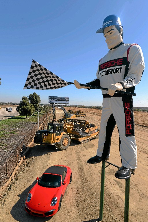 Golf Man's transformation into "Porsche Man" has become complete in this Oct. 2013 photo. (Photo @ Axel Koester / Porsche, All Rights Reserved, 2013)