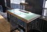 Orginal writing tables with bronze fixtures still are in use at the San Pedro post office.  (May 2015 Daily Breeze file photo)