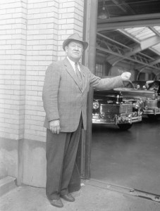 Jim Thorpe, one-time Carlisle football player, who was known as one of the greatest halfbacks in the country, and who is now working as a plant production policeman at the River Rouge plant of the Ford Motor Company, is shown on the job outside the factory building on May 22, 1942. (AP Photo)