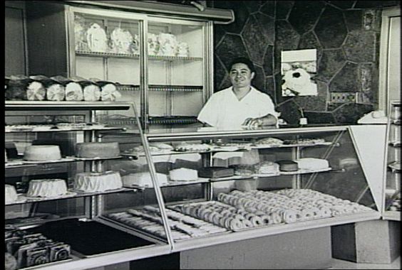 Robert Taira behind the counter of Robert's Bakery in this undated 1950s file photo. (Photo credit: King's Hawaiian)