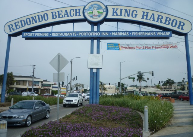 The Redondo Beach gateway sign in its current configuration, with a single southbound Catalina Avenue lane, right. October 2013 Daily Breeze photo.