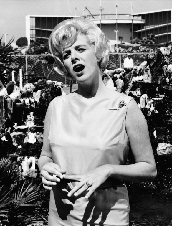 Songbird Rosemary Clooney rehearses for her TV appearance April 22, 1962 at Marineland of the Pacific, Palos Verdes Estates, Calif. The show is CBS Television's "Marineland Carnival." Rosemary is returning to full-time show business following the breakup of her eight-year marriage to actor-director Joses Ferrer. (AP Photo)