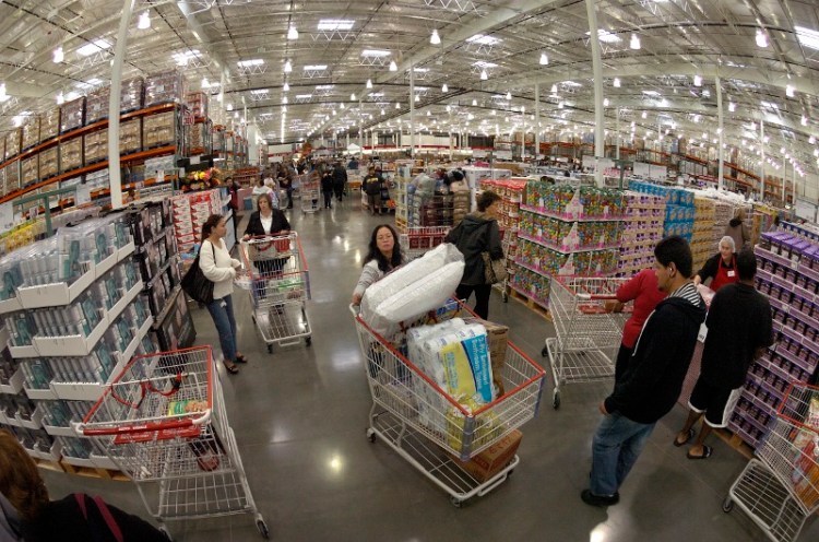Crowds of people fill the aisles of the just-opened Costco located in the Lakewood Center Mall, which opened in September 2009. (Daily Breeze staff file photo) Photo by Steven Georges/Press-Telegram
