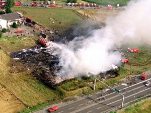 This July 25, 2000, file photo from The Associated Press shows an aerial view of the scene where an Air France Concorde plane crashed shortly after takeoff onto a hotel in Gonesse outside Paris, killing all 109 on board and 4 people on the ground.