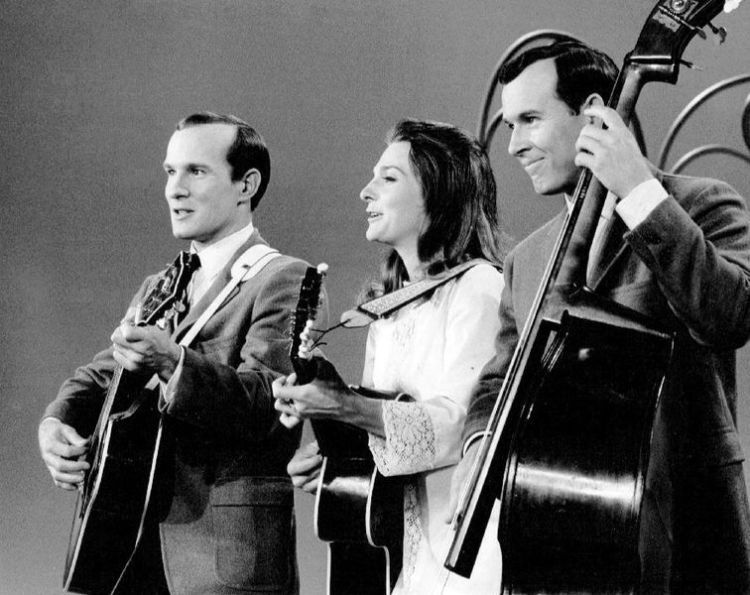 Judy Collins, center, performs with the Smothers Brothers on "The Smothers Brothers Comedy Hour" in 1967. (Publicity photo)