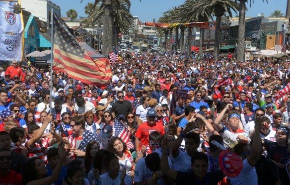 A cheering crowd watches the U.S. play Ghana during the 2014 World Cup soccer telecast viewing party at Pier Plaza in Hermosa Beach. (Daily Breeze staff file photo)