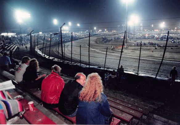 Spectators on the first turn at Ascot Park in August 1990. (Daily Breeze staff file photo)